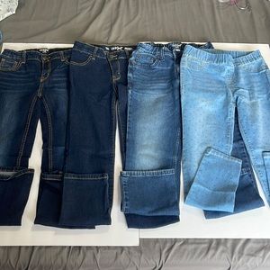 Size 10 girls. Cat & Jack. 2 nwot dark pair. 2 used great condition. Bundle